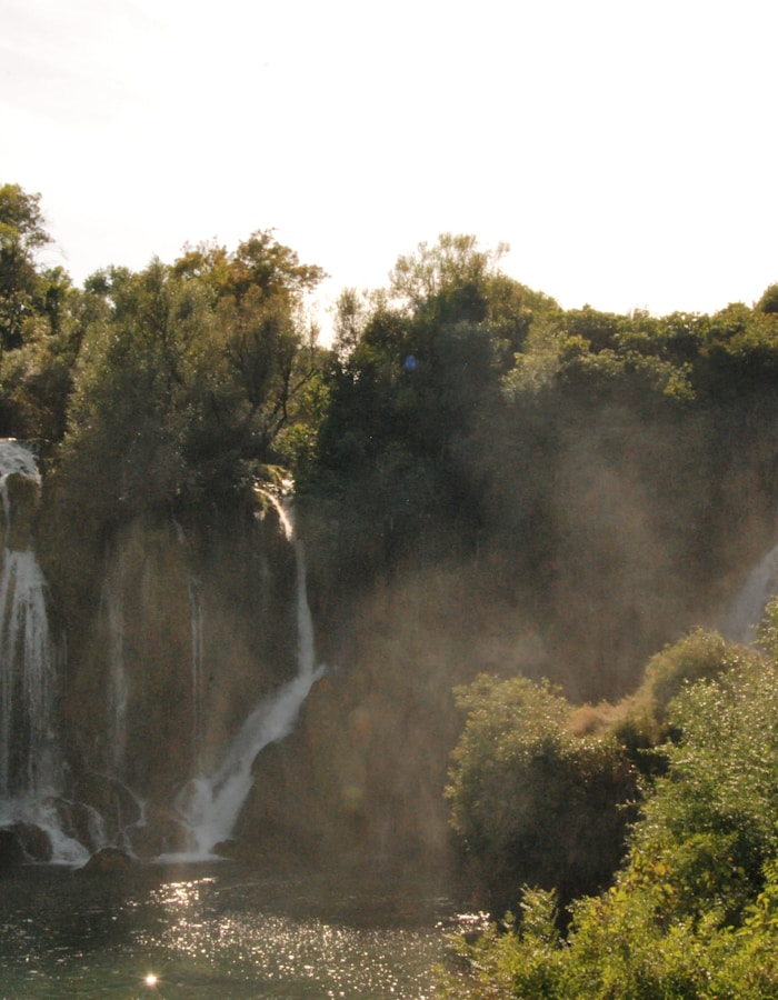 Kravica Waterfalls — swim beneath the cascade